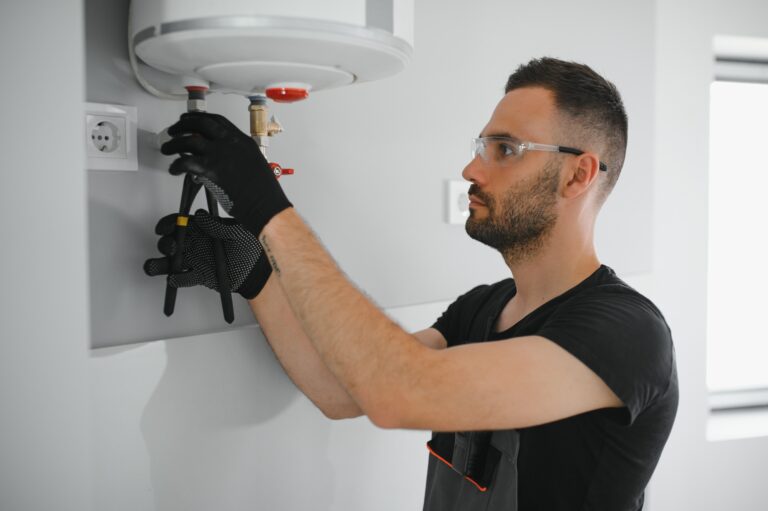 LPG Services Professional plumber checking a boiler and pipes, boiler service concept