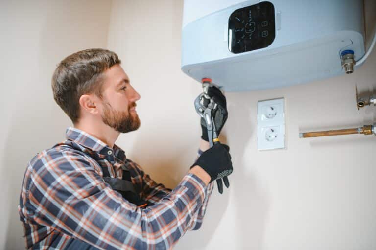LPG Services worker set up central gas heating boiler at home
